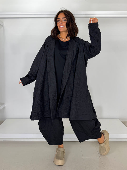 Pantalone maxi ovetto stropicciato