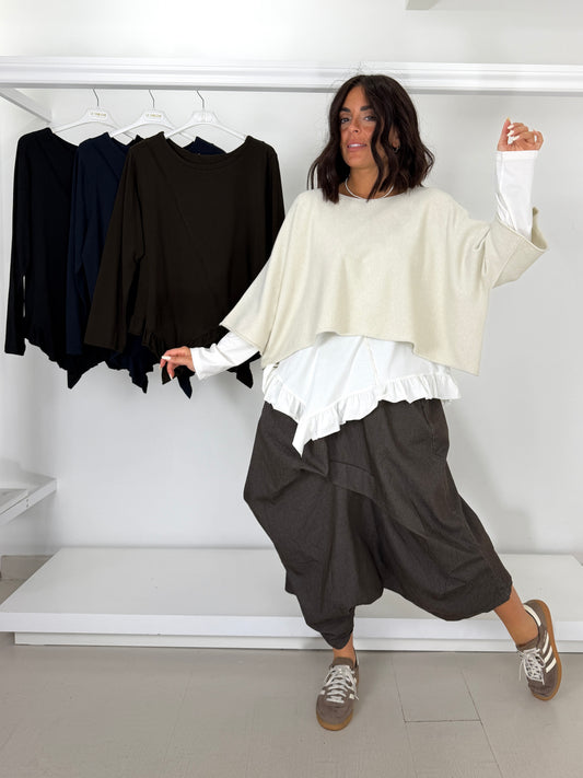 Maglia asimmetrica con frappina
