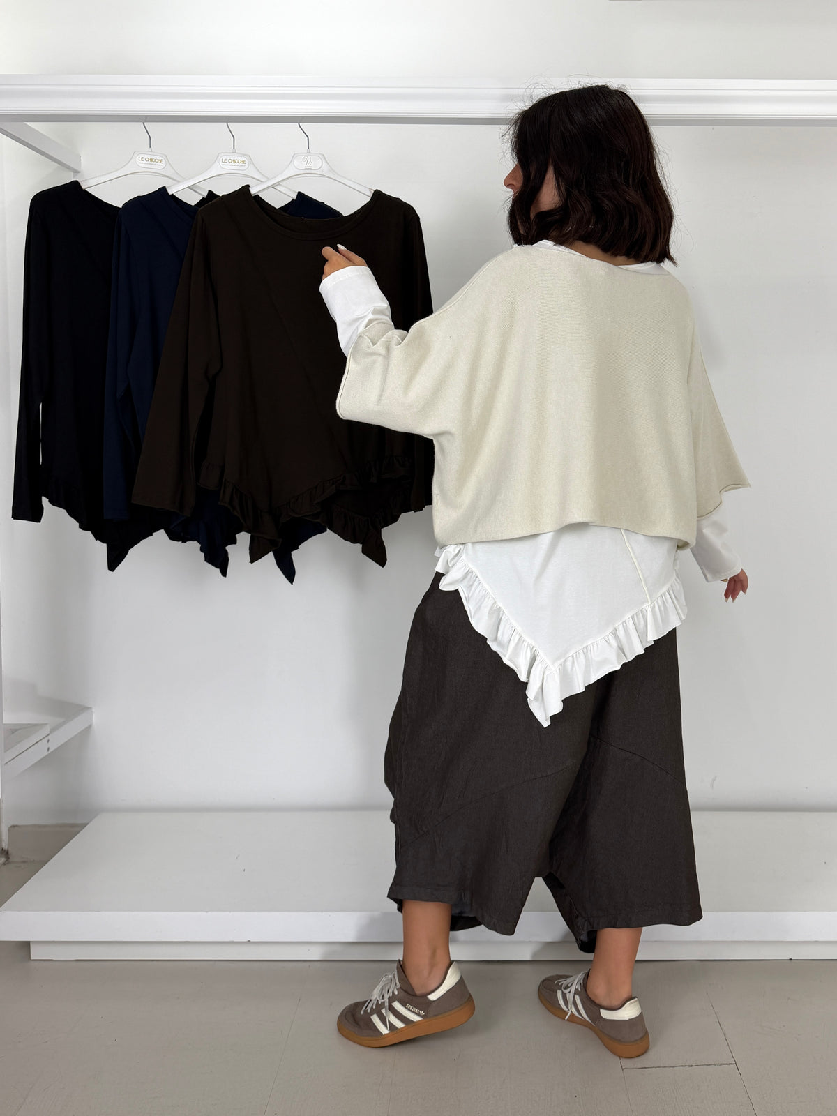 Maglia asimmetrica con frappina